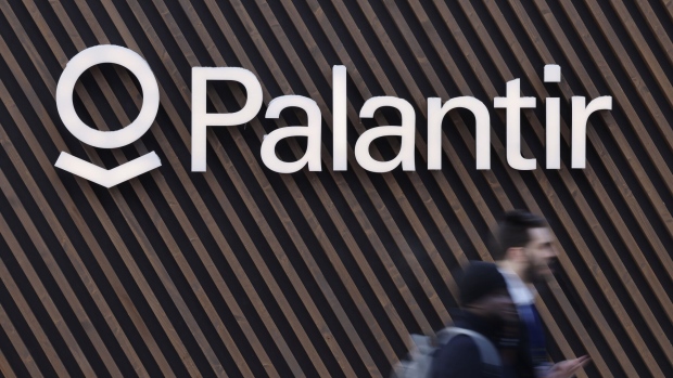 A logo outside the Palantir Technologies Inc. pavilion ahead of the World Economic Forum (WEF) in Davos, Switzerland, on Monday, Jan. 15, 2024. The annual Davos gathering of political leaders, top executives and celebrities runs from January 15 to 19. Photographer: Stefan Wermuth/Bloomberg