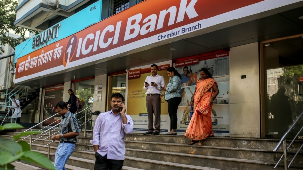 <p>An ICICI Bank branch in Mumbai.</p>
