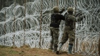 Polish soldiers construct a razor wire fence along the border with Russia’s Kaliningrad. in Zerdziny, Poland.