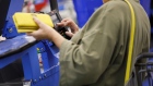 A customer uses a credit card terminal to complete a purchase at a Wal-Mart Stores Inc. location in Burbank, California, U.S., on Thursday, Nov. 16, 2017. Black Friday, the day after Thanksgiving, marks the traditional start to the U.S. holiday shopping season. 