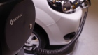 An electric cable charges a Renault SA Kangoo ZE Business Maxi automobile on day two of the 88th Gen