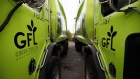 GFL Environmental Inc. garbage trucks sit parked in Toronto, Ontario, Canada, on Thursday, Oct. 24, 2019. 