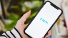 The logo for the Zoom Video Communications Inc. application is displayed on an Apple Inc. iPhone in an arranged photograph taken in the Brooklyn borough of New York, U.S., on Friday, April 10, 2020
