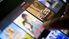 The Netflix Inc. app is demonstrated for a photograph on an Apple Inc. iPad mini tablet computer in Tiskilwa, Illinois, U.S., on Tuesday, July 12, 2016.
