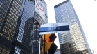 A "Bay Street" sign is displayed in the financial district of Toronto, Ontario, Canada, on Friday, Feb. 21, 2020. Canadian stocks declined with global markets, as authorities struggled to keep the coronavirus from spreading more widely outside China. However, investors flocking to safe havens such as gold offset the sell-off in Canada's stock market.