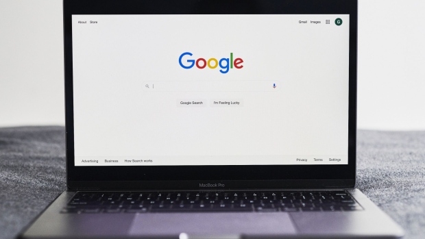 The Alphabet Inc. Google search page is displayed on a laptop computer in an arranged photograph taken in the Brooklyn Borough of New York, U.S., on Friday, July 24, 2020. Alphabet Inc. is scheduled to release earnings figures on July 30.