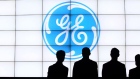 The General Electric Co. (GE) logo Photographer: Goh Seng Chong/Bloomberg