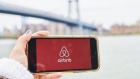 AirBnb Inc. signage is displayed on an smartphone in an arranged photograph taken in the Brooklyn borough of New York, U.S., on Friday, April 17, 2020. Home-sharing leader Airbnb Inc. lined up $1 billion in debt boosting a financial cushion it can use to grow and pay bills as the global coronavirus pandemic crushes demand for travel and diminishes the prospect of an initial public offering.
