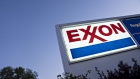 Signage is displayed at an Exxon Mobil Corp. gas station in Arlington, Virginia, U.S., on Wednesday, April 29, 2020. Exxon is scheduled to released earnings figures on May 1. 