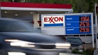 A vehicle passes an Exxon Mobil Corp. gas station in Arlington, Virginia, U.S., on Wednesday, April 29, 2020. Exxon is scheduled to released earnings figures on May 1. Photographer: Andrew Harrer/Bloomberg