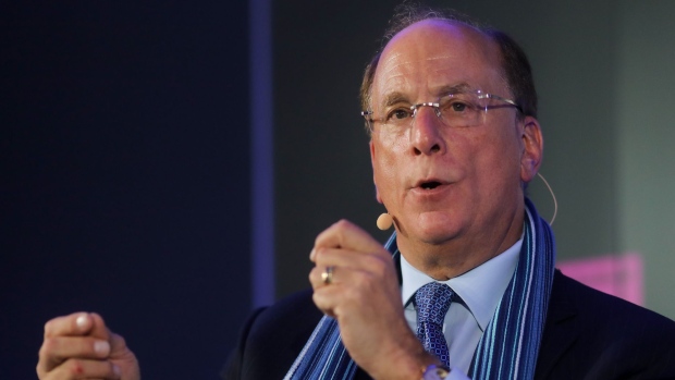 Larry Fink, chief executive officer of BlackRock Inc., gestures as he speaks during a Bloomberg event on the opening day of the World Economic Forum (WEF) in Davos, Switzerland, on Tuesday, Jan. 21, 2020. World leaders, influential executives, bankers and policy makers attend the 50th annual meeting of the World Economic Forum in Davos from Jan. 21 - 24.