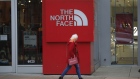 A shopper passes in front of a North Face Inc. store at the Easton Town Center Mall in Columbus, Ohio, U.S., on Thursday, Jan. 7, 2021. The U.S. Census Bureau is scheduled to release retail sales figures on January 15.