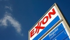 BURBANK, CA - FEBRUARY 01: An Exxon gas station advertises its gas prices on February 1, 2008 in Burbank, California. Exxon Mobil Corp. has posted an annual profit of $40.6 billion, the largest ever by a US company, and set a new US record for the highest quarterly profit, $11.7 billion for the last three months of 2007. The previous annual profit record, $39.5 billion, was set by Exxon in 2006. The company's revenue also rose 30 percent in the fourth quarter, from $90 billion a year ago to $116.6 billion. Yearly sales were up from $377.64 billion in 2006 to a new company record of $404.5 billion. Exxon was particularly benefited by historic crude prices at the end of the year. Exxon Mobil is the world?s largest publicly traded oil company. (Photo by David McNew/Getty Images) Photographer: David McNew/Getty Images North America