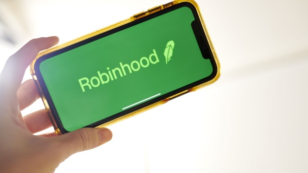 The logo for Robinhood is displayed on a smartphone in an arranged photograph taken in the Brooklyn borough of New York, U.S., on Monday, Oct. 12, 2020.