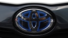 The Toyota Motor Corp. logo is seen on a Prius PHV plug-in hybrid vehicle equipped with a solar charging system in Tokyo Japan, on Tuesday, Sept. 11, 2019. Toyota, Sharp Corp. and New Energy and Industrial Technology Development Organization of Japan, or NEDO, are testing a new solar-powered Prius since July. Photographer: Toru Hanai/Bloomberg