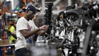 A worker assembles a vehicle component at the Ford Motor Co. Chicago Assembly Plant in Chicago, Illinois, U.S., on Monday, June 24, 2019. Ford invested $1 billion in Chicago Assembly and Stamping plants and added 500 jobs to expand capacity for the production of all-new Ford Explorer, Explorer Hybrid, Police Interceptor Utility and Lincoln Aviator. Photographer: Daniel Acker/Bloomberg