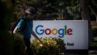 A pedestrian walks past signage at Google Inc. headquarters in Mountain View, California, U.S., on Wednesday, April 25, 2018. Alphabet Inc. is pushing efforts to roll back the most comprehensive biometric privacy law in the U.S., even as the company and its peers face heightened scrutiny after the unauthorized sharing of data at Facebook Inc. Photographer: David Paul Morris/Bloomberg