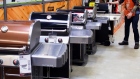Barbecue grills for sale at a Home Depot store.  Photographer: Scott Olson/Getty Images