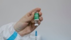 BELGRADE, SERBIA - MARCH 20: This picture shows a vial of the Oxford-AstraZeneca anti-Covid-19 vaccine (India's Covishield) on March 20, 2021 in Belgrade, Serbia. Turn out for vaccination appointments was low on this day, however, Serbia has now vaccinated almost 15% of the county's 6.9 million inhabitants, coming in second after Britain in the world's quickest vaccine rollout. Serbs have the choice of five different vaccines and inoculations are free of charge. (Photo by Vladimir Zivojinovic/Getty Images) Photographer: Vladimir Zivojinovic/Getty Images Europe