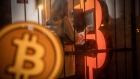 A customer uses a bitcoin automated teller machine (ATM) in a kiosk Barcelona, Spain, on Tuesday, Feb. 23, 2021. Bitcoin climbed, aided by supportive comments from Ark Investment Management’s Cathie Wood and news that Square Inc. boosted its stake in the cryptocurrency. Photographer: Angel Garcia/Bloomberg