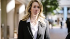 Elizabeth Holmes leaves federal court in San Jose, California, in 2019.