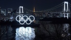 Illuminated Olympic rings float in the waters off Odaiba island in Tokyo, Japan, on Thursday, Jan. 14, 2021. While Japan’s infection count has been well below other rich industrialized nations, the pandemic has been a persistent cloud over the Olympics since they were delayed almost a year ago. Photographer: Toru Hanai/Bloomberg