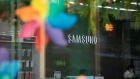 Signage for Samsung Electronics Co. is displayed at the company's Digital Plaza store in Seoul, South Korea, on Sunday, July 5, 2020. Samsung settled a patent lawsuit in Texas that had been slated next week for one of the nations first live jury trials since the start of the coronavirus outbreak, despite a surge in infections in the state.