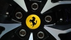 The prancing horse logo sits on a wheel hub of a Ferrari Monza SP1. Photographer: Krisztian Bocsi/Bloomberg