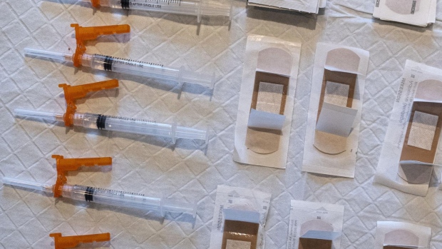 Syringes with prepared doses of the Johnson & Johnson Janssen Covid-19 vaccine and bandages at San Rafael Commons in San Rafael, California.