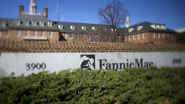 The Fannie Mae headquarters stands in this photograph taken with a tilt-shift lens in Washington, D.C., U.S., on Tuesday, April 2, 2013. Fannie Mae, the mortgage financier seized by U.S. regulators during the credit crisis, reported the largest annual profit in company history as a housing rebound helped the firm stop drawing federal aid. Photographer: Bloomberg/Bloomberg