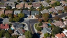 Houses stand in this aerial photograph taken near Cupertino, California, U.S., on Wednesday, Oct. 23, 2019. Facebook Inc. is following other tech titans like Microsoft Corp. and Google, pledging to use its deep pockets to ease the affordable housing shortage in West Coast cities. The social media giant said that it would commit $1 billion over the next decade to address the crisis in the San Francisco Bay Area. Photographer: Sam Hall/Bloomberg