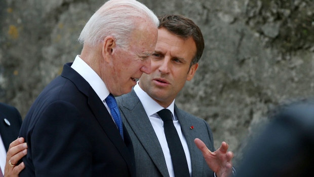 Joe Biden walks with Emmanuel Macron on the first day of the Group of Seven leaders summit in Carbis Bay, U.K. on June 11.