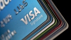 A Visa Inc. credit card is arranged for a photograph with other credit cards in Washington, D.C., U.S., on Friday, Oct. 21, 2016. Visa is scheduled to release fourth-quarter earnings figures on October 24.