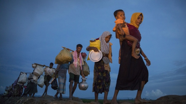Rohingya refugees flee Myanmar and head towards Cox's Bazar in Bangladesh, in Oct. 2017.