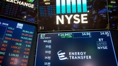 A monitor displays Energy Transfer LP signage on the floor of the New York Stock Exchange (NYSE) in New York, U.S., on Monday, Nov. 19, 2018. U.S. stocks slumped, with megacap technology shares leading the way down, as investor pessimism about escalating trade tensions between the Trump Administration and China took hold. Photographer: Michael Nagle/Bloomberg