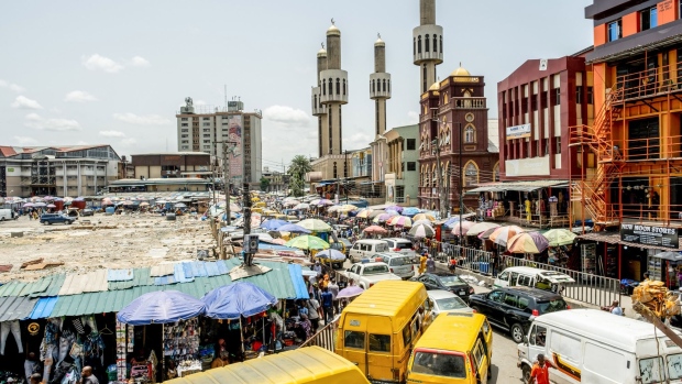 Heavy traffic surrounds the roads by a market in Lagos, Nigeria, on Friday, April 22, 2022. Choked supply chains, partly due to Russia’s invasion of Ukraine, and an almost 100% increase in gasoline prices this year, are placing upward price pressures on Africa’s largest economy.