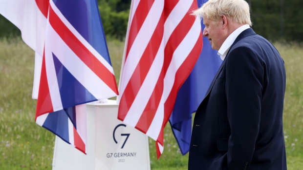 Boris Johnson, UK Prime Minister, at the family photo on the opening day of the Group of Seven (G-7) leaders summit at the Schloss Elmau luxury hotel in Elmau, Germany, on Sunday, June 26, 2022.