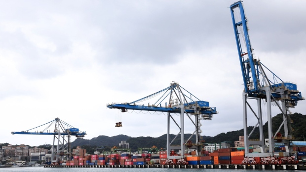Gantry cranes at the Port of Keelung in Keelung, Taiwan, on Friday, Jan. 7, 2022. Taiwan exports extended their double-digit growth for a tenth month, with shipments from the island in 2021 smashing all records due to soaring demand for technology products and components.
