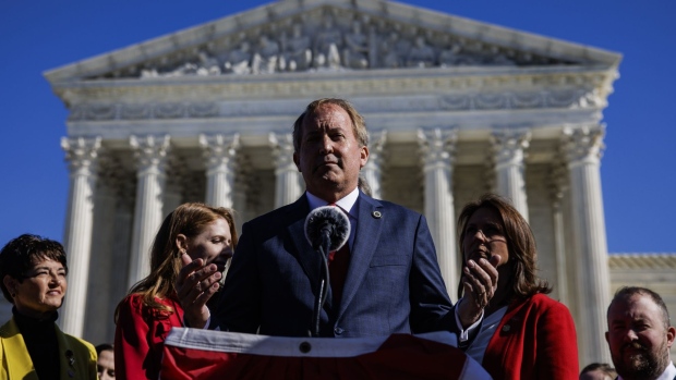 Ken Paxton, Texas attorney general, speaks outside of the U.S. Supreme Court in Washington, D.C., U.S., on Monday, Nov. 1, 2021. The Texas abortion clash goes before the court today, with providers and the Biden administration trying to cut through a procedural haze to block a law that has largely shut down the practice in the country's second-largest state.