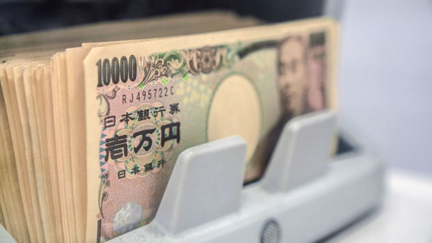 A surge in rates in Japan, home to millions of savers who invest in bonds around the world, would reverberate quickly across financial markets. Photographer: Soichiro Koriyama/Bloomberg