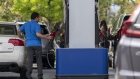 Customers refuel at a Costco gas station in Concord, California, U.S., on Wednesday, June 22, 2022. President Joe Biden called on Congress to suspend the federal gasoline tax, a largely symbolic move by an embattled president running out of options to ease pump prices weighing on his party's political prospects.