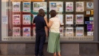 Pedestrians look at properties listings in an estate agents window in Margate, UK, on Friday, June 17, 2022. Experts say office workers being set free offers a rare opportunity to kickstart sluggish economies.