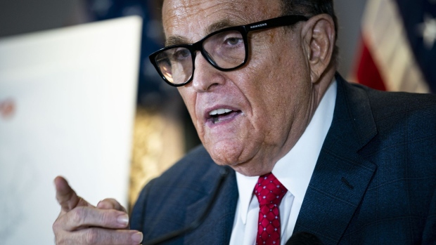 Rudy Giuliani, personal lawyer to U.S. President Donald Trump, speaks during a news conference at the Republican National Committee headquarters in Washington, D.C., U.S., on Thursday, Nov. 19, 2020. President Donald Trump’s campaign revised a pivotal Pennsylvania lawsuit seeking to block certification of the state’s election results, adding a proposal that the Republican-controlled state legislature choose the winner instead of voters.
