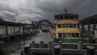 A ferry docked near Sydney Harbour Bridge in Sydney, Australia, on Monday, Feb. 28, 2022. Australia is scheduled to release gross domestic product (GDP) figures on March 2. Photographer: Brent Lewin/Bloomberg