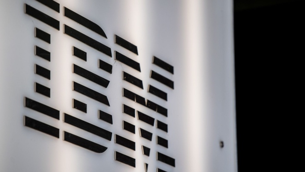 A logo of International Business Machines Corp. (IBM) sits on their offices in London, U.K., on Monday, Oct. 29, 2018. IBM's $33 billion purchase of Red Hat Inc. -- the world's second-largest technology deal ever -- is aimed at catapulting the company into the ranks of the top cloud software competitors. Photographer: Chris J. Ratcliffe/Bloomberg