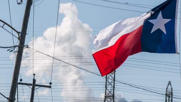 HOUSTON, TEXAS - JANUARY 21: The Texas state flag is seen near an oil refinery on January 21, 2022 in Houston, Texas. Oil prices have retreated from seven-year highs after an unexpected rise in U.S. crude and fuel inventories. (Photo by Brandon Bell/Getty Images)