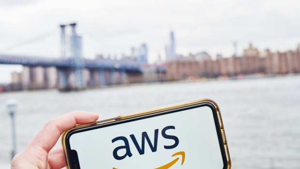The logo for Amazon Web Services Inc., a subsidiary of Amazon.com Inc., is displayed on an Apple Inc. iPhone in an arranged photograph taken in the Brooklyn Borough of New York, U.S., on Monday, Jan. 27, 2020. Amazon.com Inc. is scheduled to release earnings figures on January 30. Photographer: Gabby Jones/Bloomberg