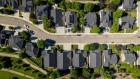 Houses in Meridian, Idaho, US, on Thursday, June 30, 2022. The housing market slowdown is having ripple effects across the industry and mortgage lenders are forecasting a slump in business.