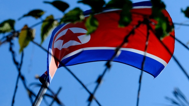 A North Korean flag flies at the Embassy of North Korea compound in Kuala Lumpur, Malaysia, on Saturday, March 20, 2021. Kim Jong Un’s regime cut off diplomatic relations with Malaysia, accusing it of a “super-large hostile act” after its top court ruled a North Korean man can be extradited to the U.S. face money-laundering charges. Photographer: Samsul Said/Bloomberg