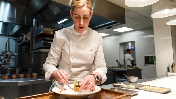 Clare Smyth, chef, prepares a dish of 'Potato and Roe' at the Core by Clare Smyth restaurant in Notting Hill, London.
